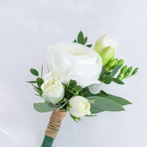 White Ranunculus Boutonniere