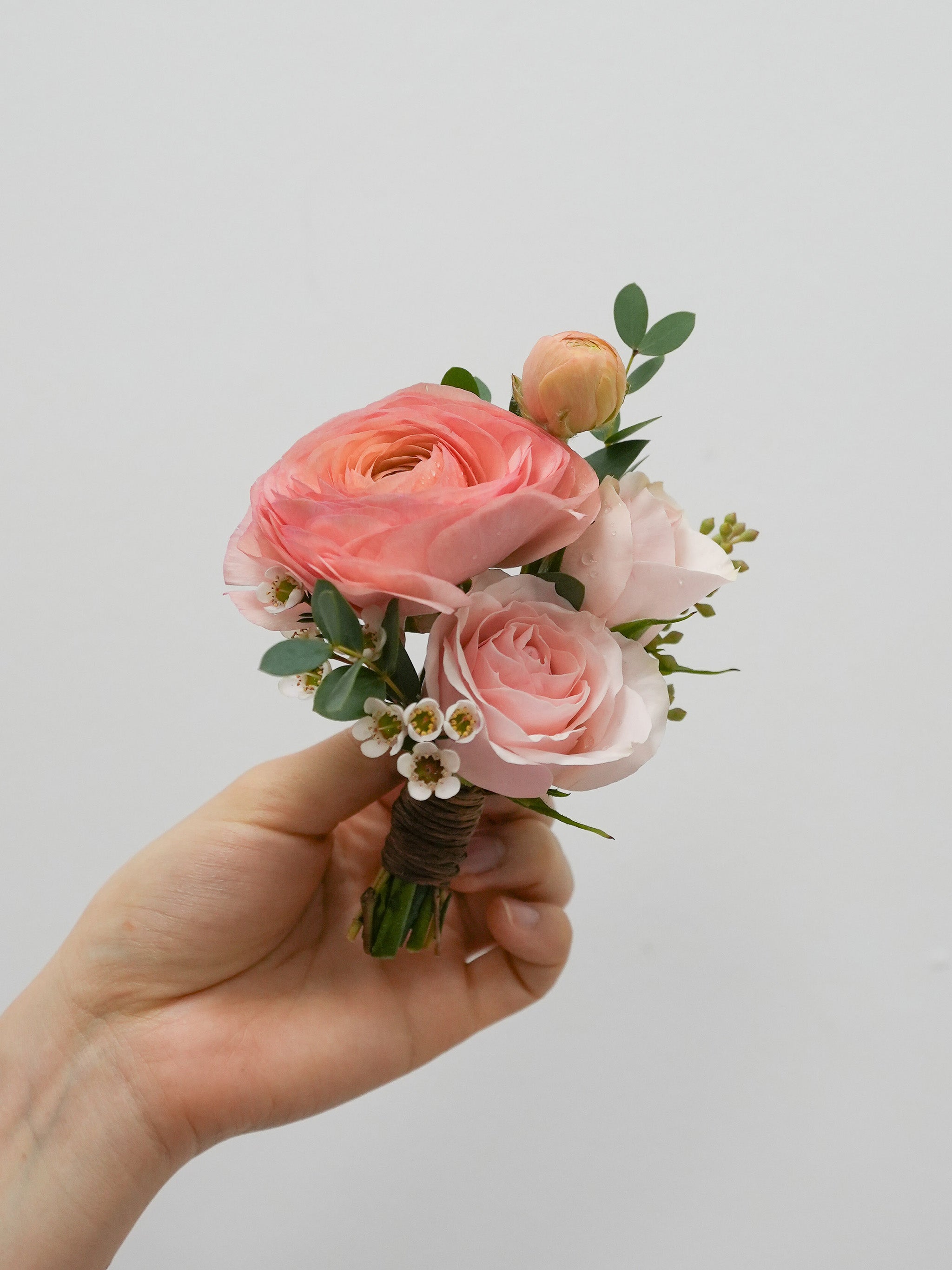 Peach Ranunculus Corsage