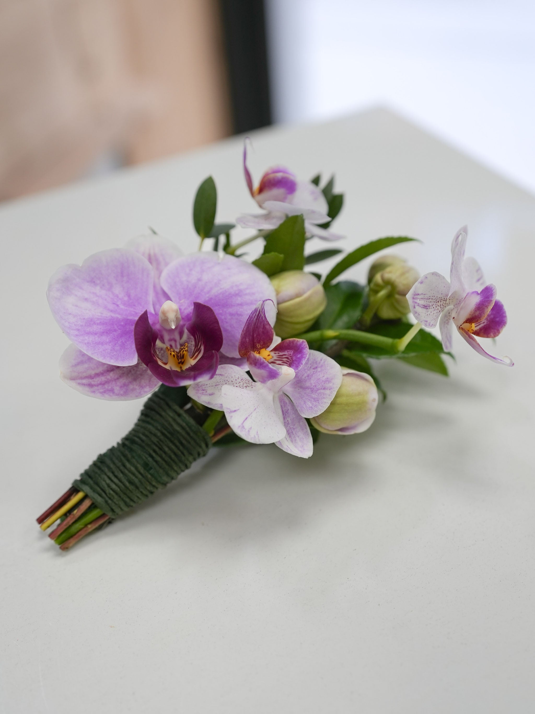 Purple Orchid Boutonniere