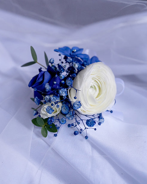 Blue Harmony Boutonnieres & Corsage
