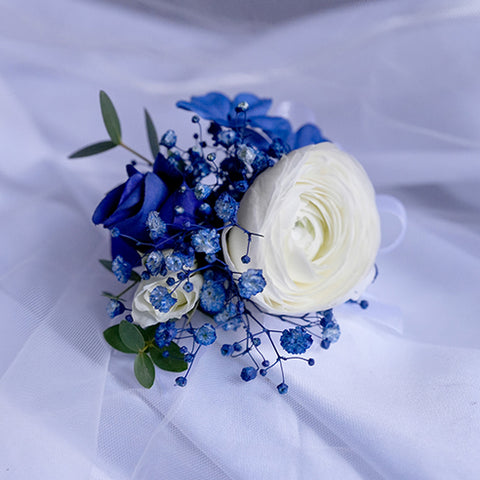 Blue Harmony Boutonnieres & Corsage