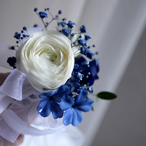 Blue Harmony Boutonnieres & Corsage