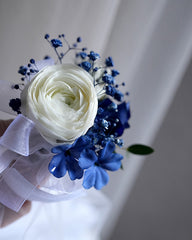 Blue Harmony Boutonnieres & Corsage