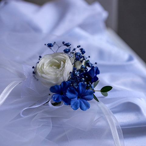 Blue Harmony Boutonnieres & Corsage